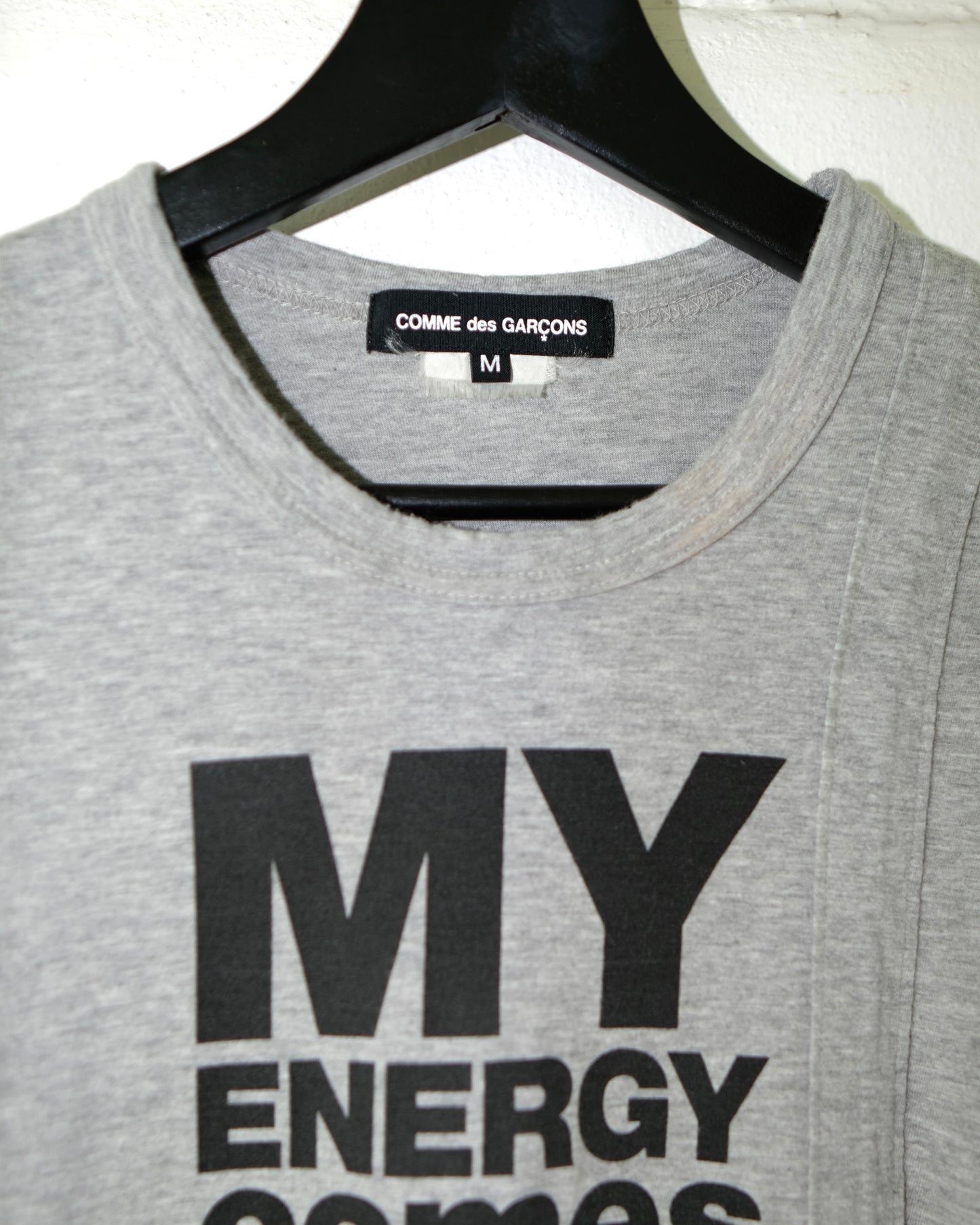 Comme Des Garcons Homme Plus
"MY ENERGY COMES FROM FREEDOM" Tee
