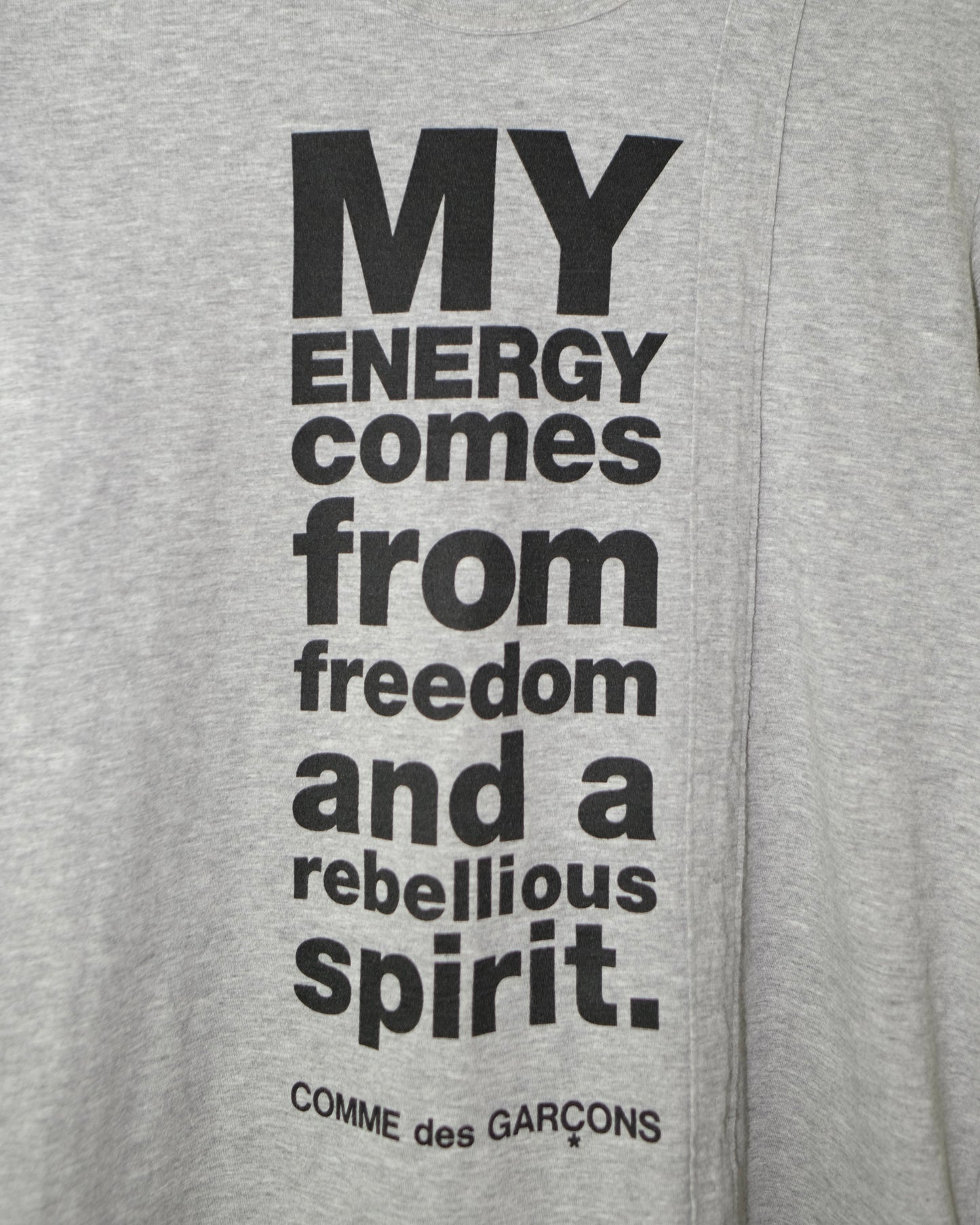 Comme Des Garcons Homme Plus
"MY ENERGY COMES FROM FREEDOM" Tee
