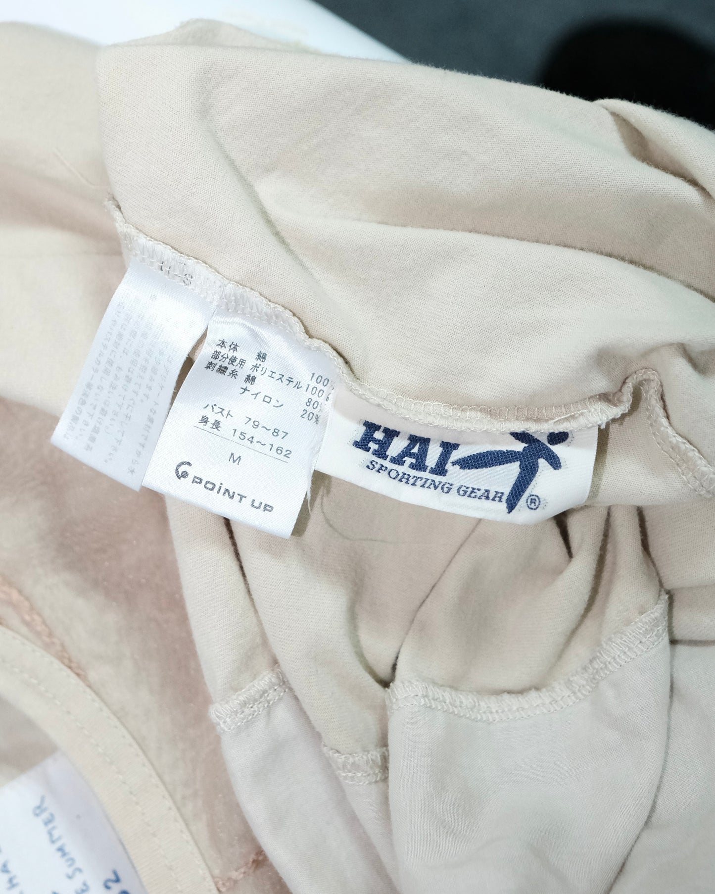 HAI SPORTING GEAR BY ISSEY MIYAKE SPIRAL EMBROIDERY TEE