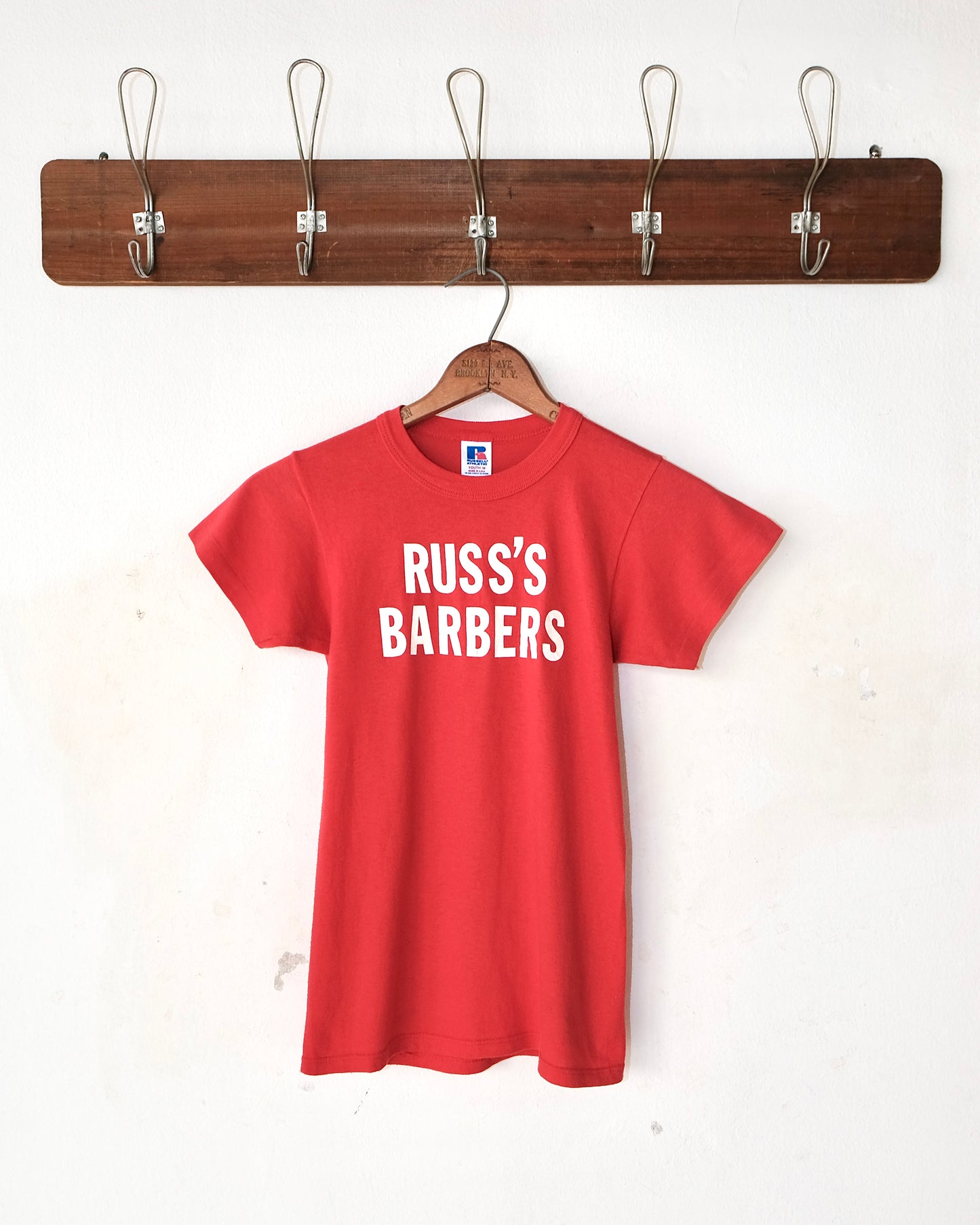 90s RUSS’S BARBERS BABY TEE