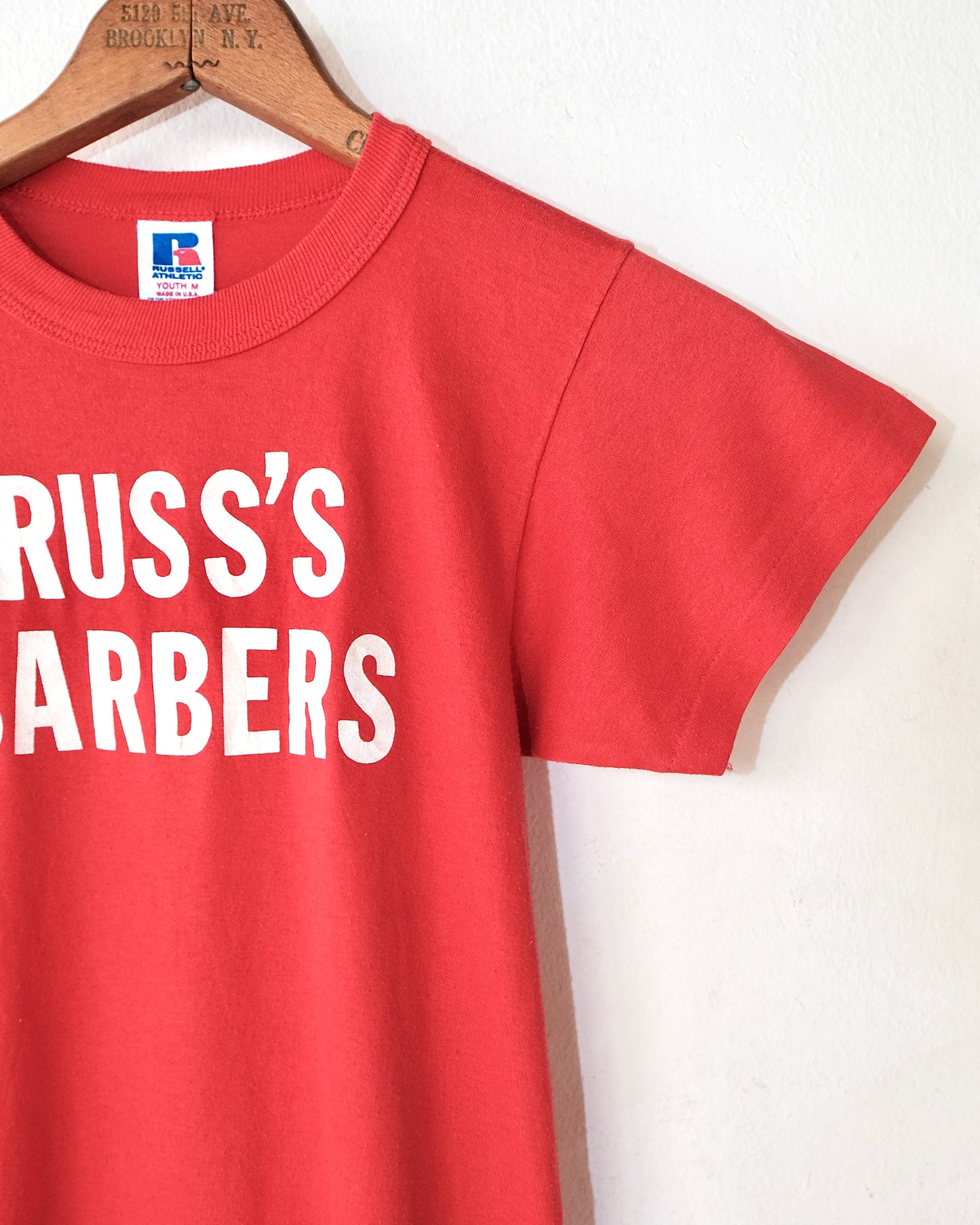 90s RUSS’S BARBERS BABY TEE