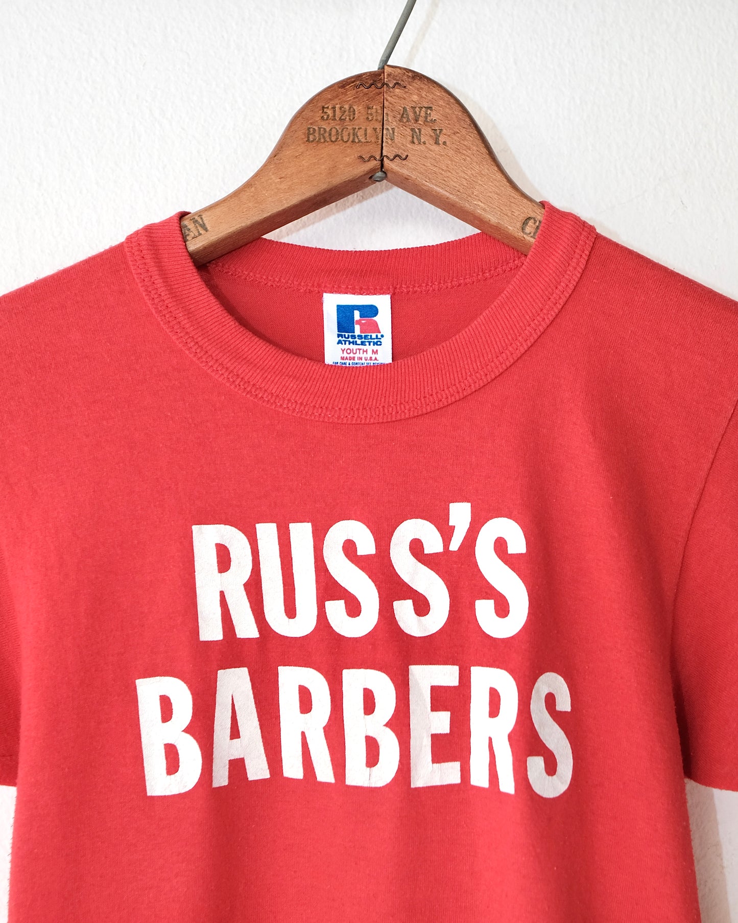 90s RUSS’S BARBERS BABY TEE