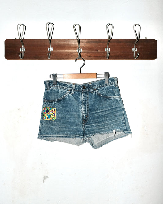 70s LEVI’S CUT-OFF WITH LOVE PATCH JEANS