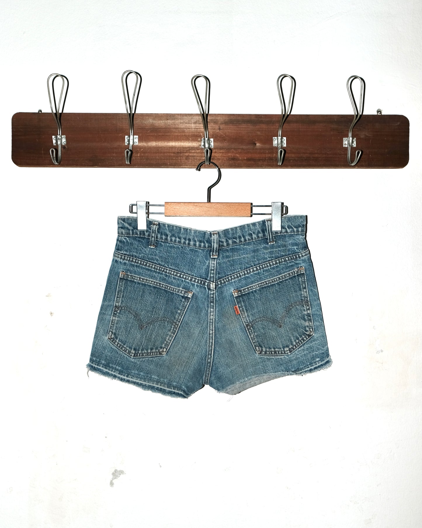 70s LEVI’S CUT-OFF WITH LOVE PATCH JEANS