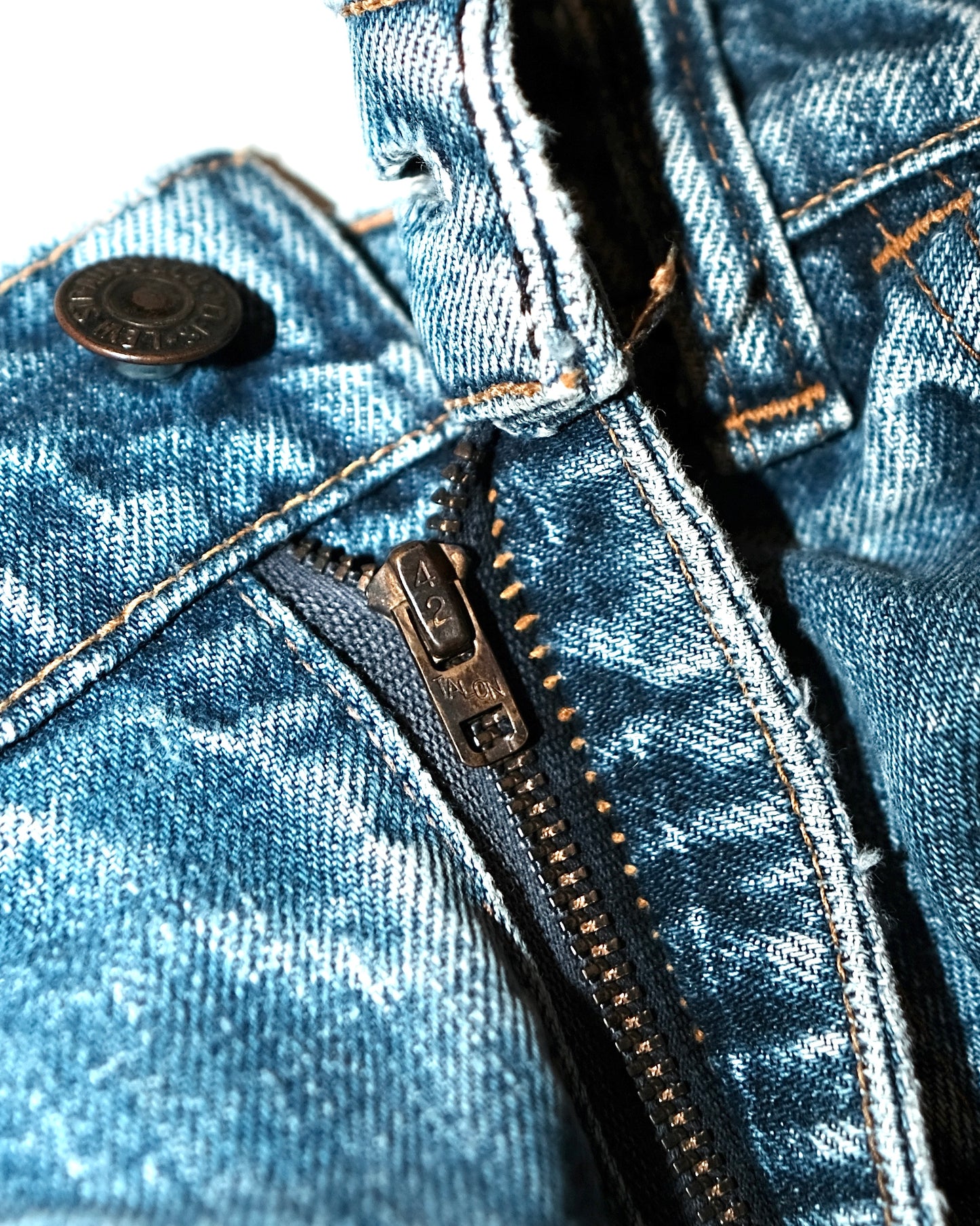 70s LEVI’S CUT-OFF WITH LOVE PATCH JEANS