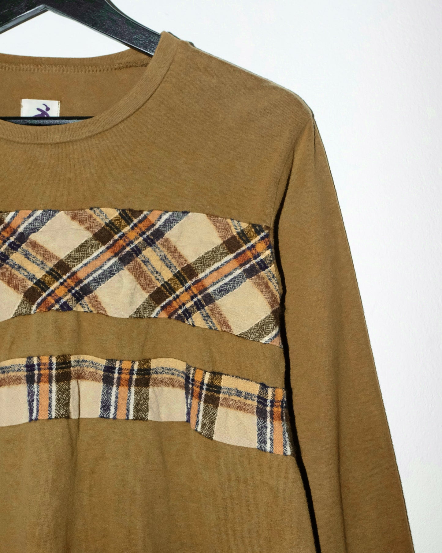 HAI SPORTING GEAR BY ISSEY MIYAKE OLIVE JUMPER WITH A PLAID PATCHWORK PANEL